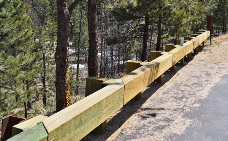 Steel Backed Timber Rail on Highway